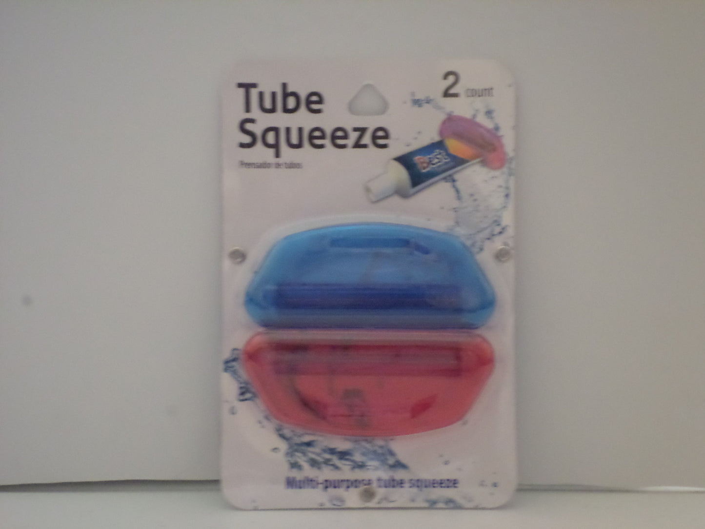 Tooth paste squeezer